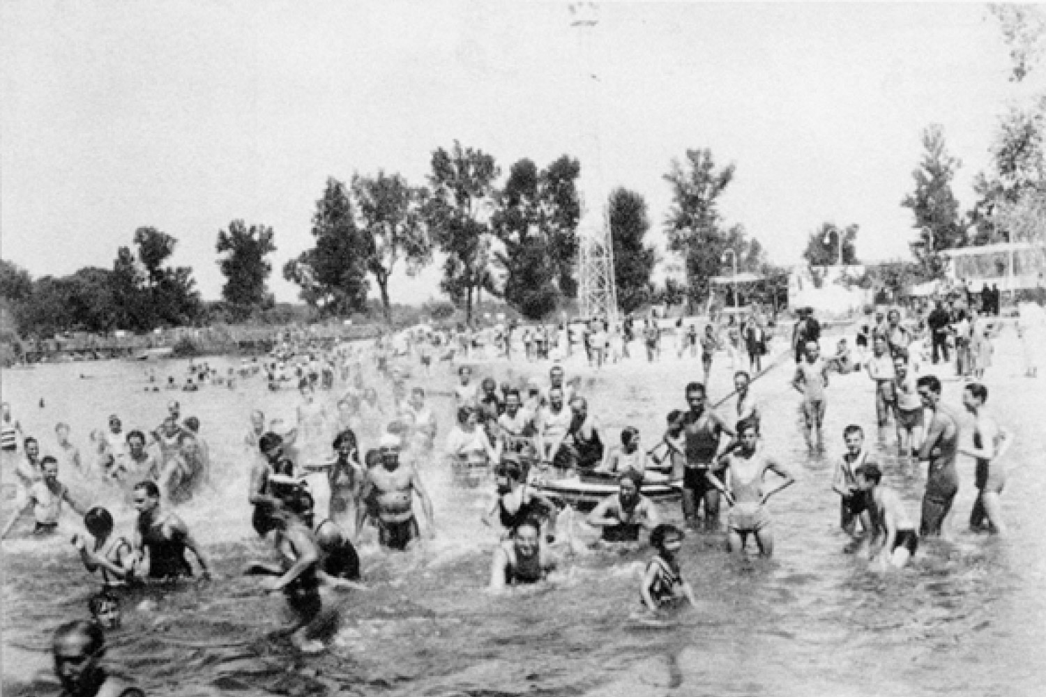 People bathing in a river in Madrid